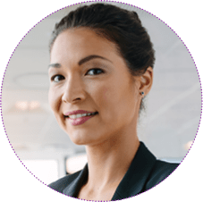 Portrait of mature businesswoman standing in office with her arms crossed and smiling. Asian female executive looking at camera confidently.